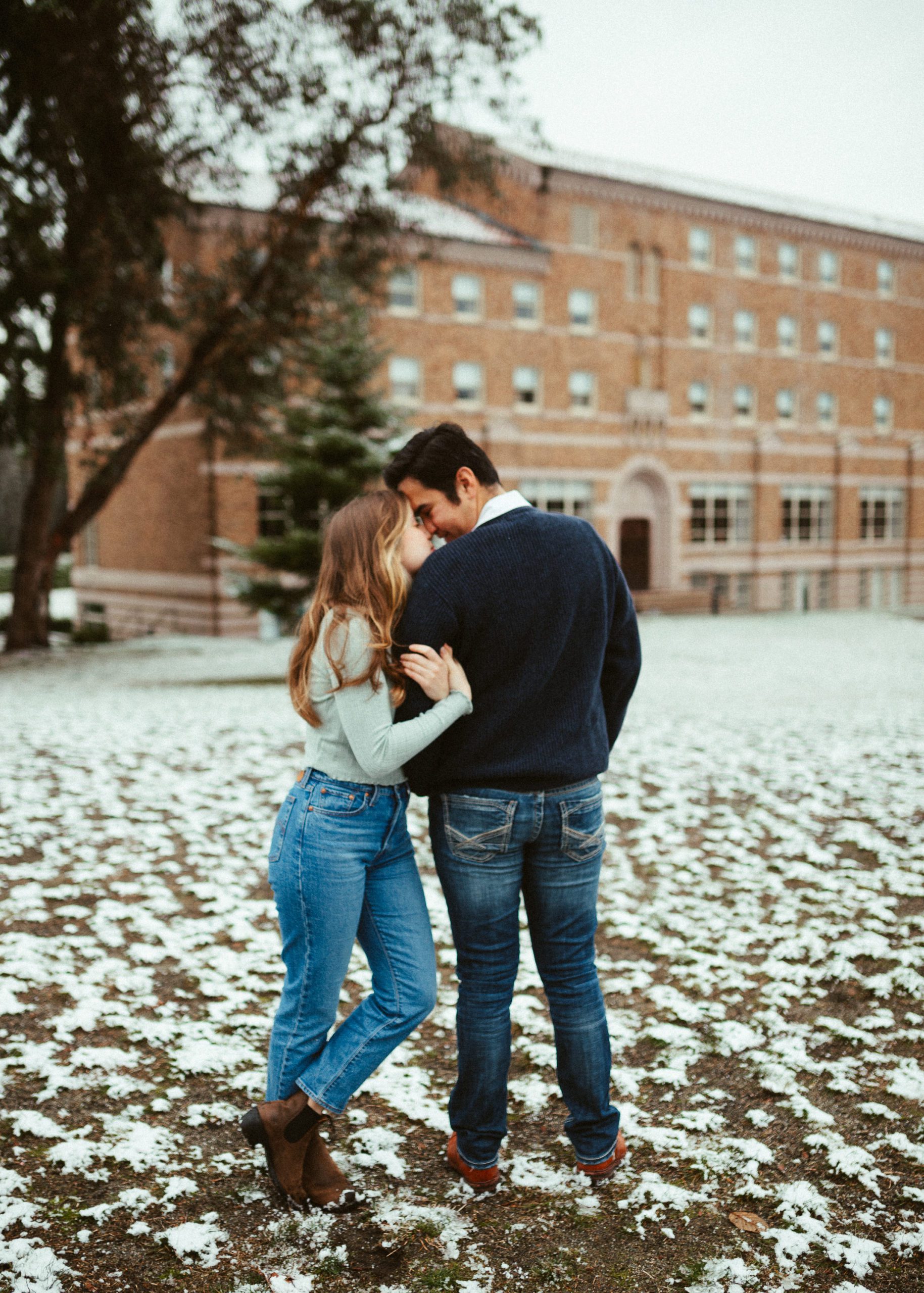 Couple takes romantic engagement photos in the snow
