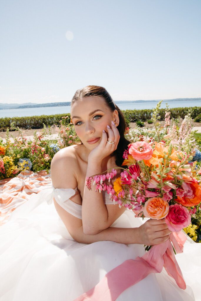 Fierce Colorful bride leaning into the camera on her wedding day
