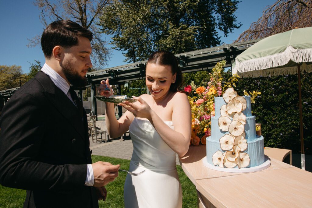 Candid emotional portrait of bride and groom laughing together